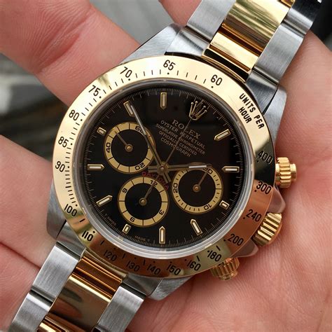 rolex daytona black and gold|which rolex daytona to buy.